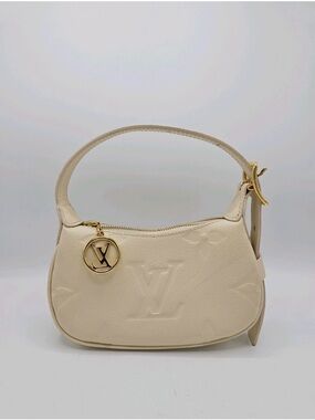 Louis Vuitton Cream Embossed Shoulder Bag with Gold Charm